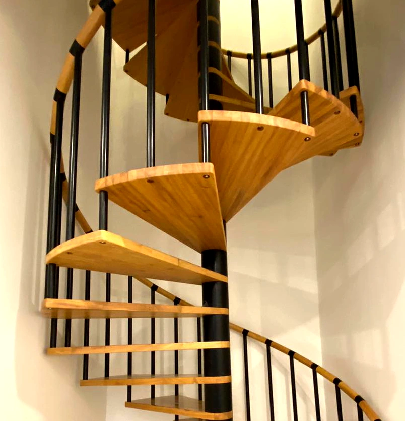 Escalera de caracol infinity para interior en metal madera